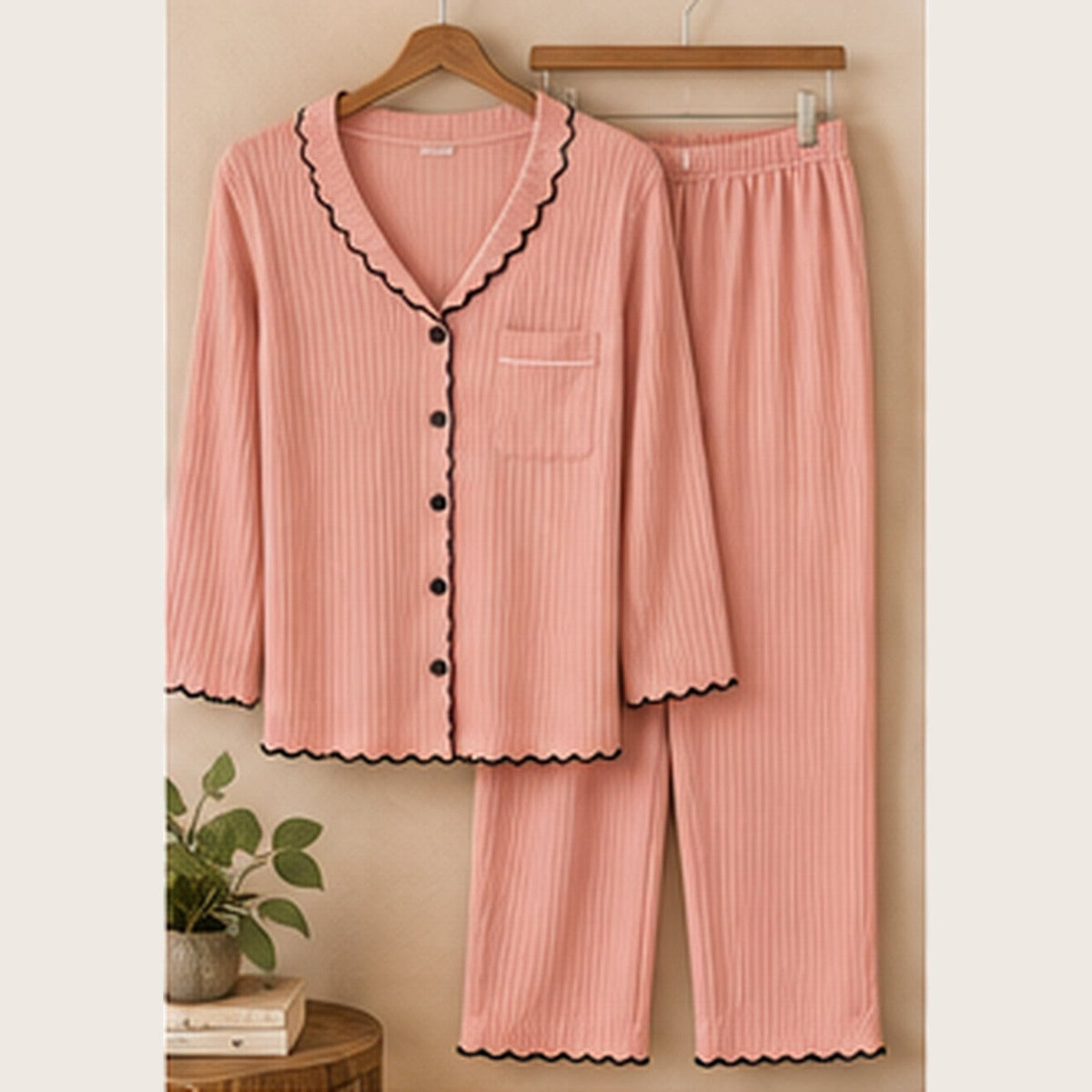 Pink ribbed bamboo pajama set product-only flat lay